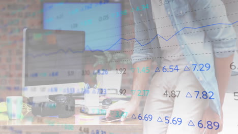 animation of financial data processing over caucasian businessman in office