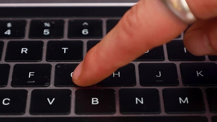Video typing buttons on a laptop.