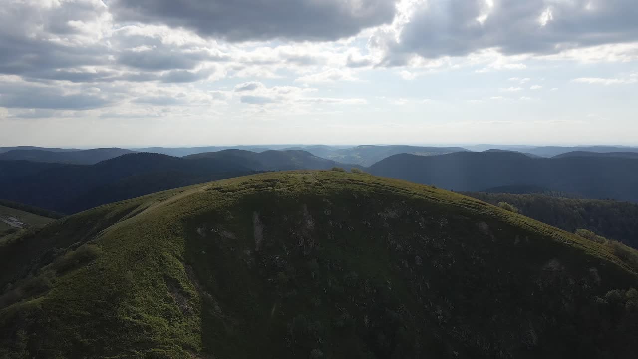 Aerial shot over mountains. Cloudy shot with mountains in the background. Les vosges, france, summit of the kastelberg