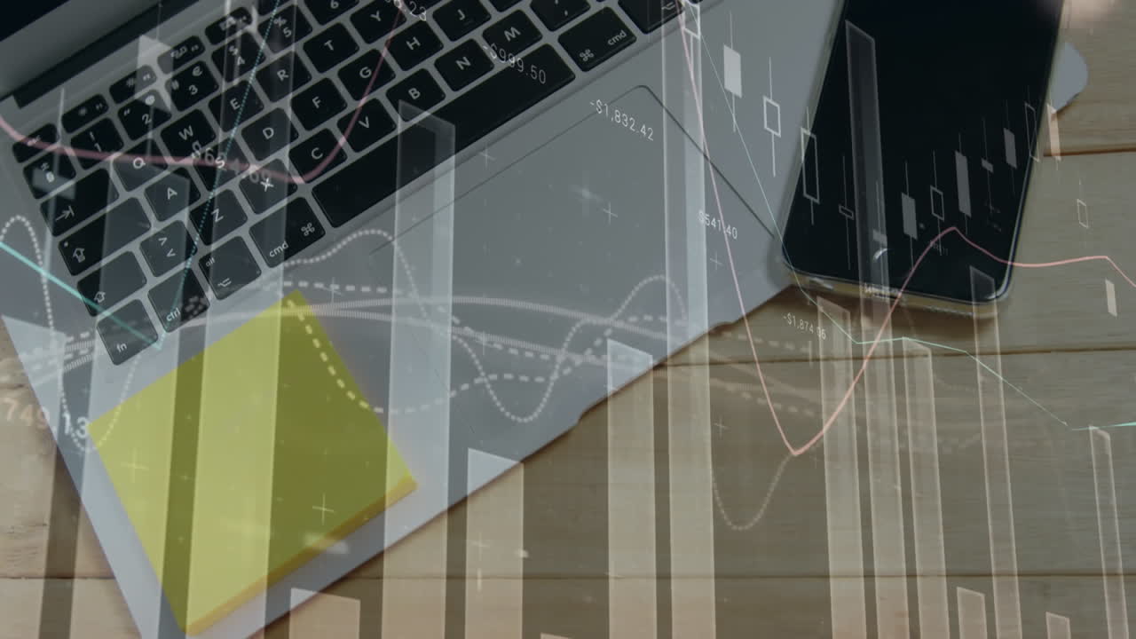 변하는 숫자를 가진 그래프의 애니메이션, 테이블 위에 있는 드폰과 노트북의 상관