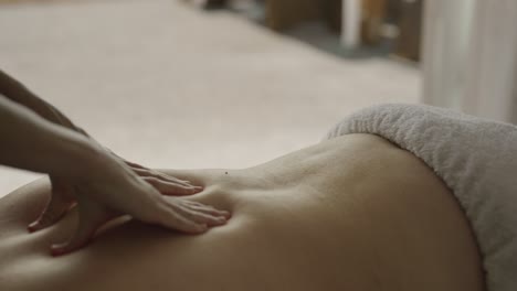 relaxing deep tissue massage on chubby female back