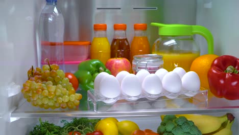 open refrigerator filled with food