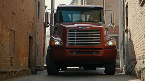red semi-truck driving down a narrow city alley