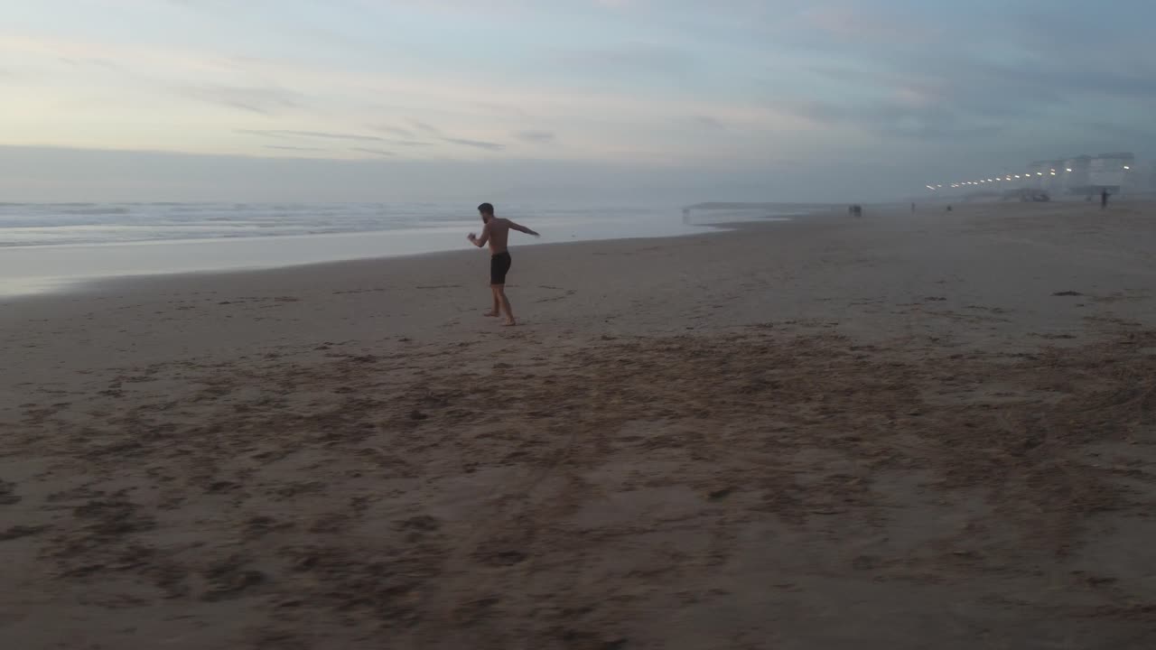 A man practicing movements based on Ido Portal's movement culture.