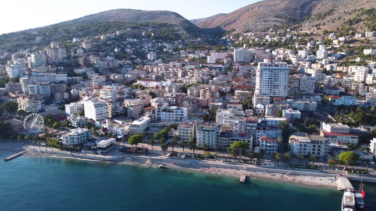 AERIAL Orbiting Shot of Sarande, Albania and the Turquoise Beach