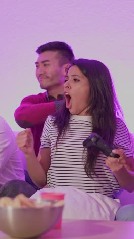 friends' intense reactions during a video game session