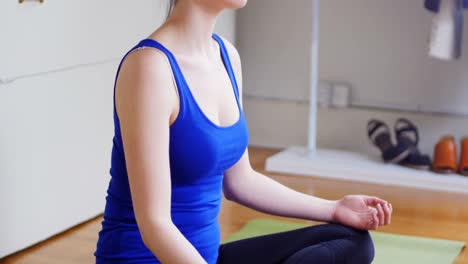 young woman performing yoga 4k