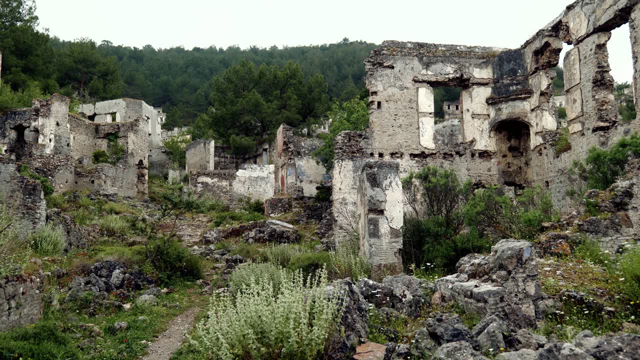 Ruins of old abandoned Greek village of Kayakoy Turkish roofless ghost town