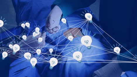 in school, surgeons operating with animation of light bulbs for innovative ideas