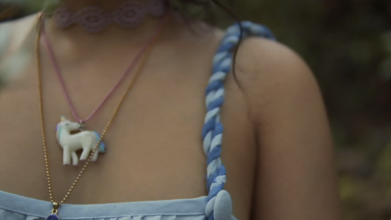 Slow motion pan over a woman's chest