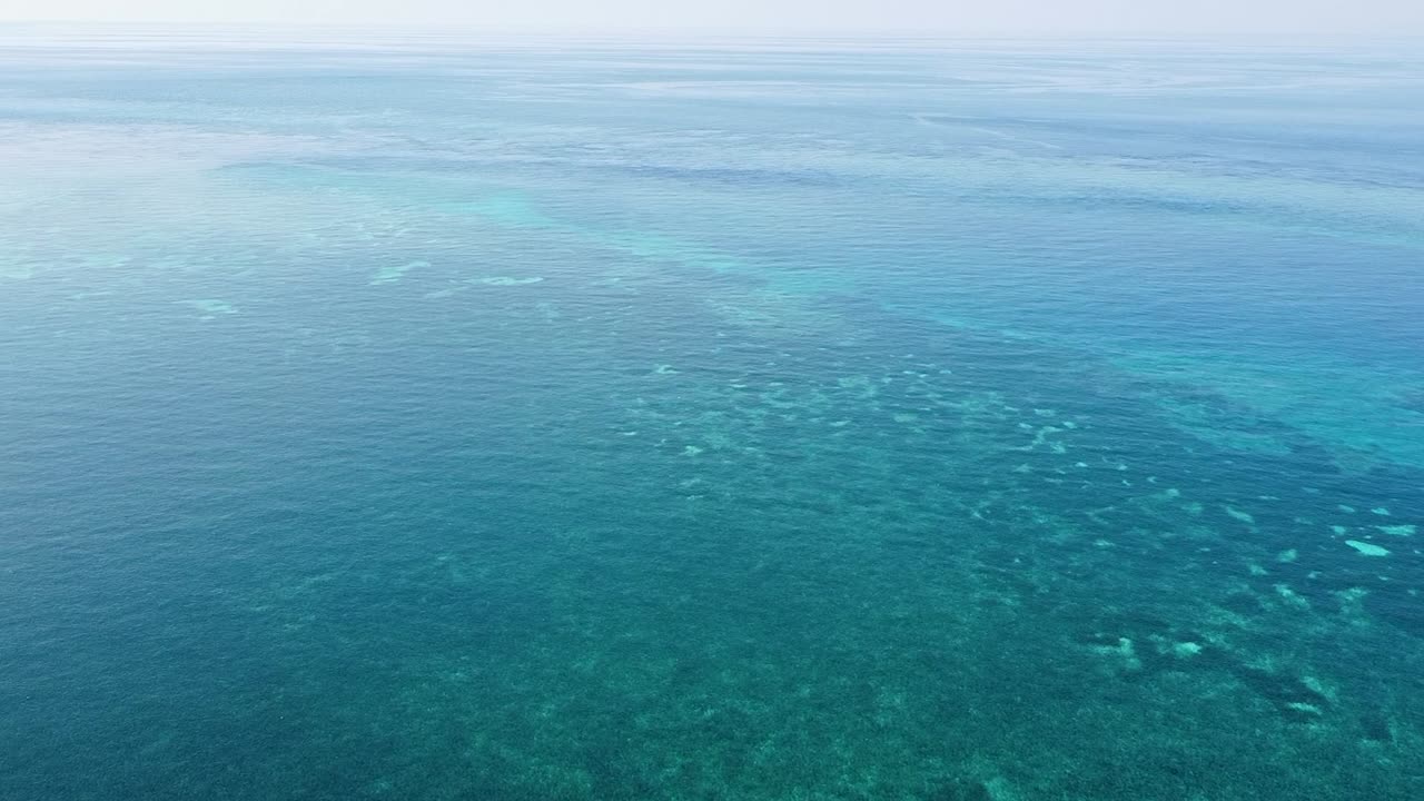 Aerial seascape view of ocean and coral reef in Coral Triangle region of Timor-Leste, Southeast Asia