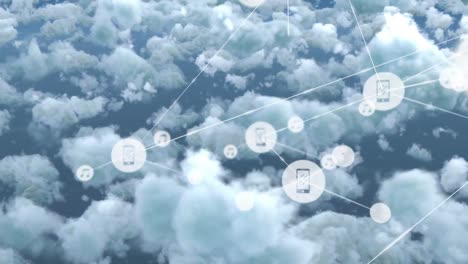 red de iconos digitales contra nubes en el cielo azul
