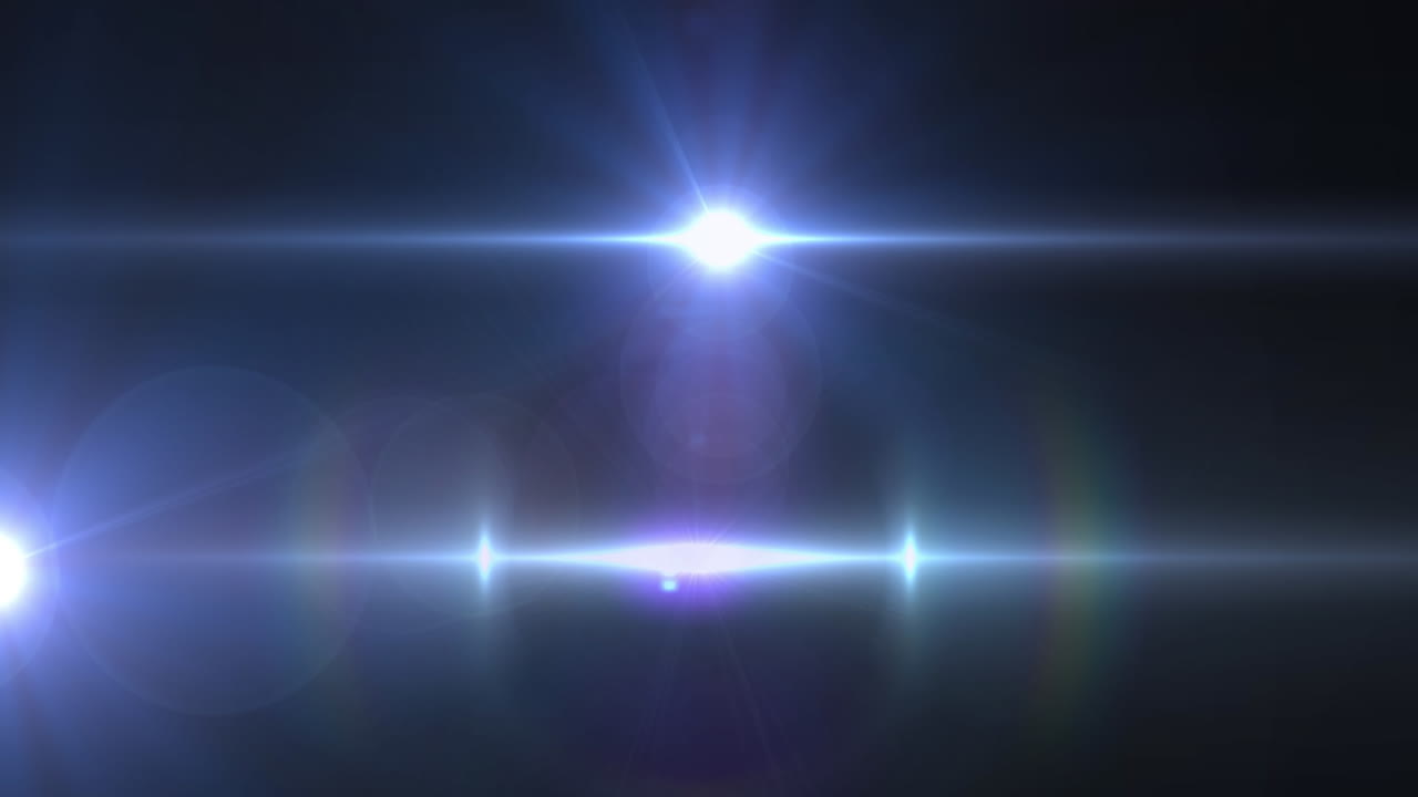 animación del foco con destello de la lente y haces de luz que se mueven sobre un fondo oscuro