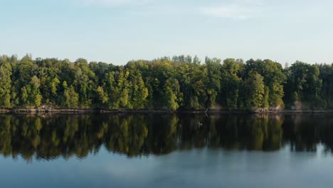 serene river landscape with fisherman