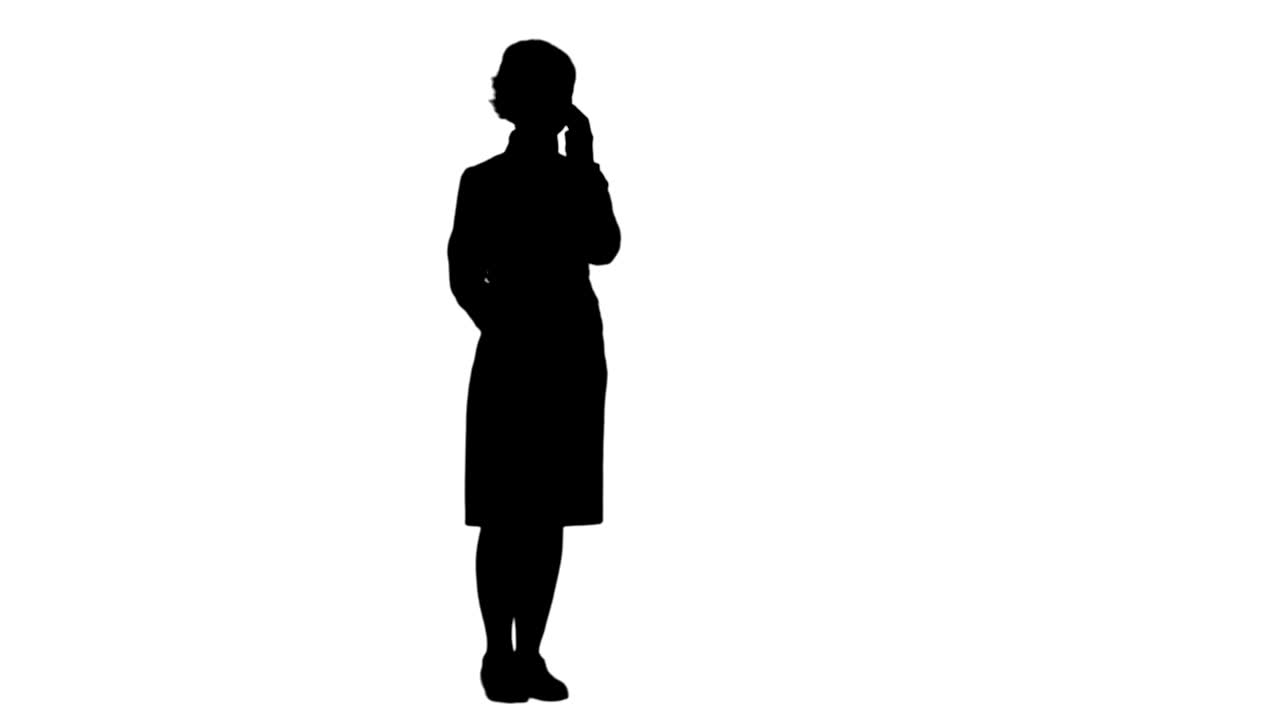 Silhouette Smiling woman having a phone call track matte