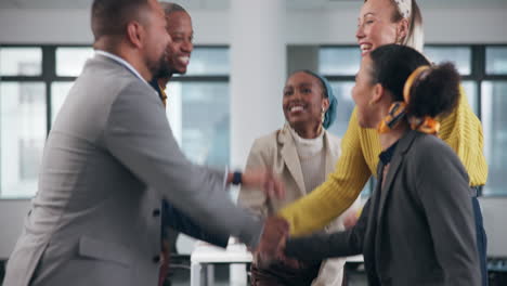 diverse business team celebrating success in office