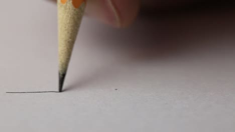 drawing a line with a pencil