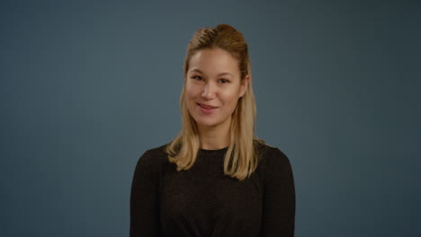 Woman-Smiles-to-Camera