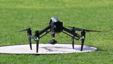 a big drone takeoff on a bright sunny day, drone flying, drone camera, quadcopters