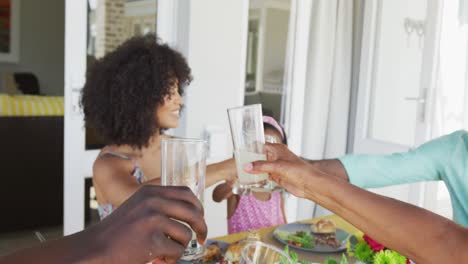 Video-of-african-american-family-spending-time-together-and-having-dinner-outside