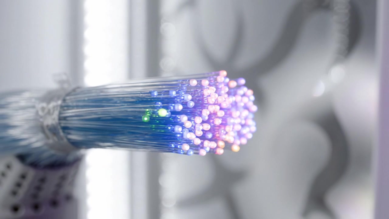 Close-up of Colorful Optical Fiber Cables with Blinking Lights Showcasing Advanced Technology in a Modern Setting