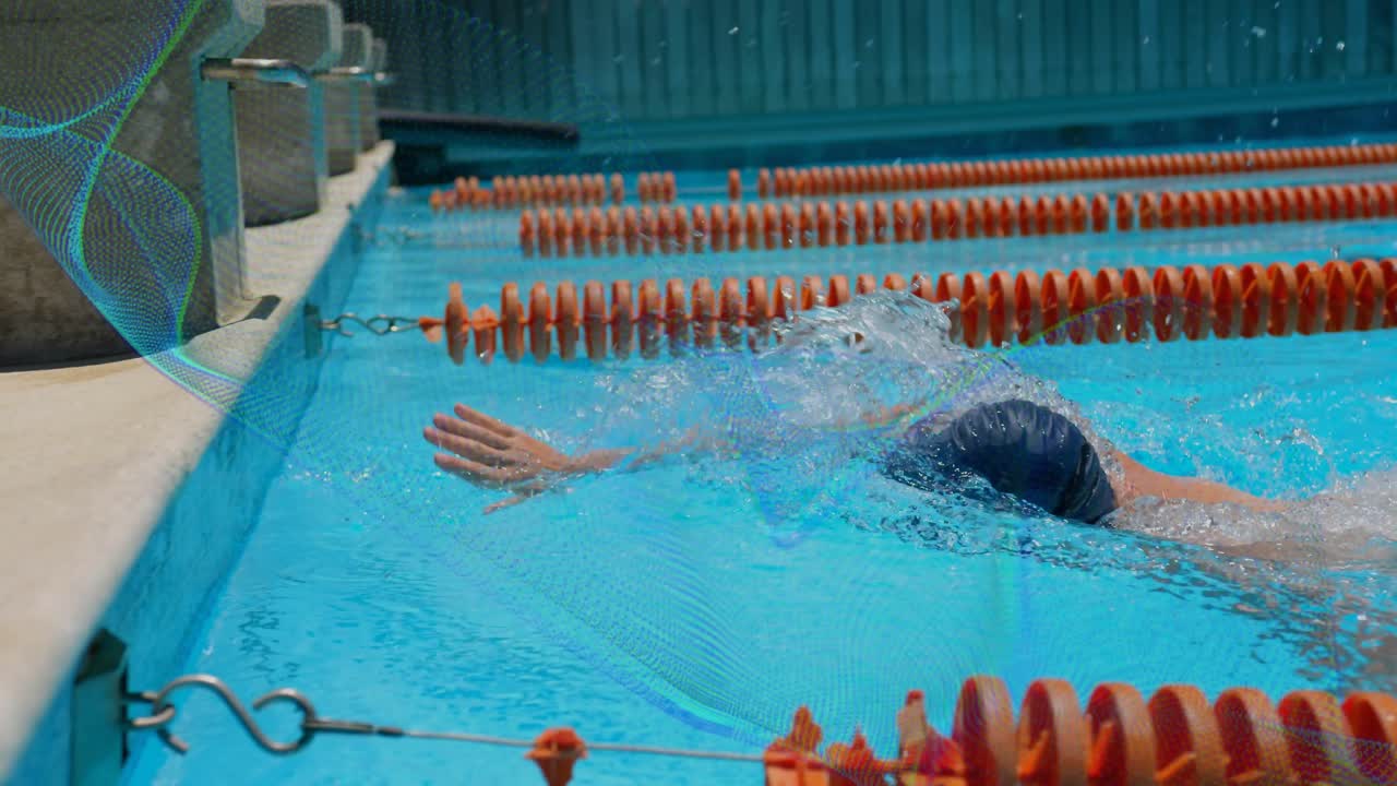 Male athlete entering pool and starting front crawl along ropes for fitness with animated lap timer