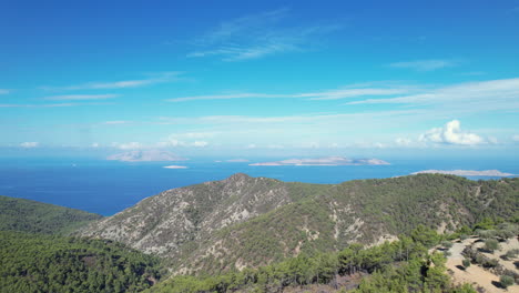 a breathtaking aerial view of the majestic greek ocean and mountain landscape