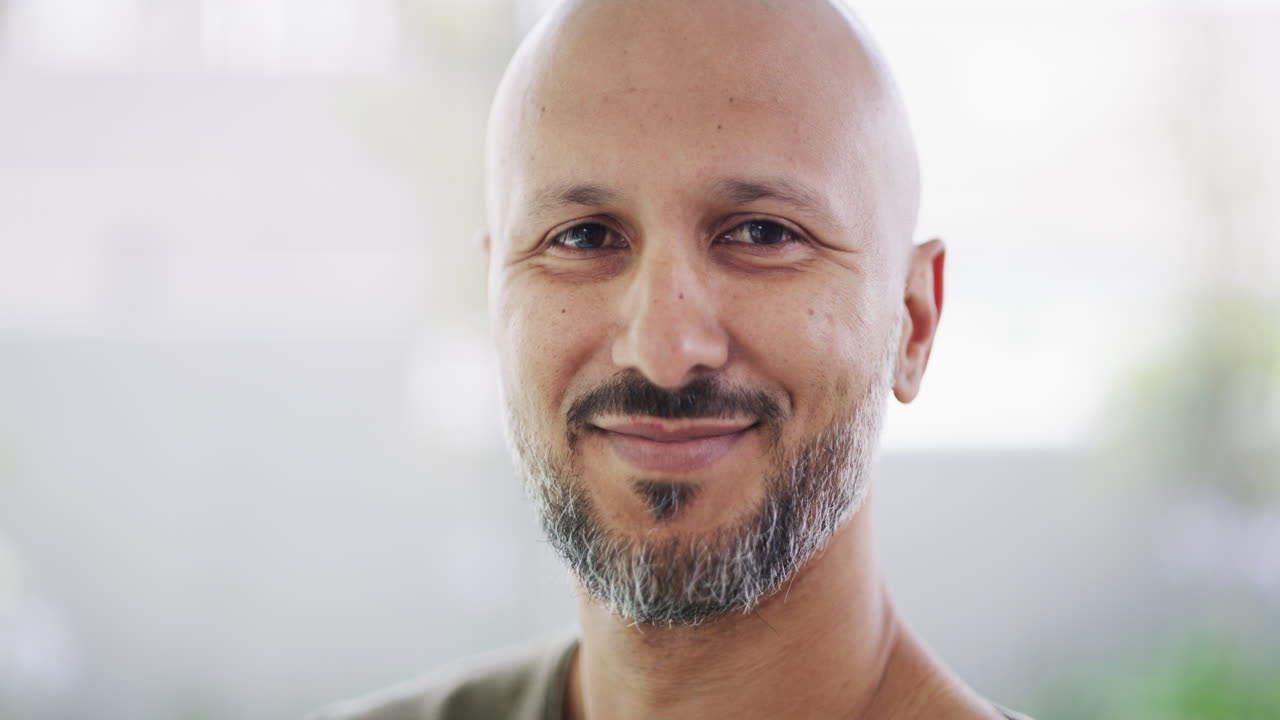 Portrait of a Smiling Bald Man