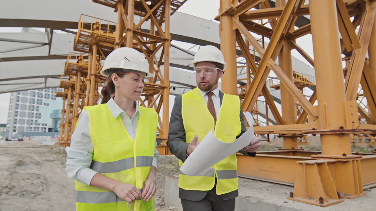 Construction Manager Showing Site to Supervisor