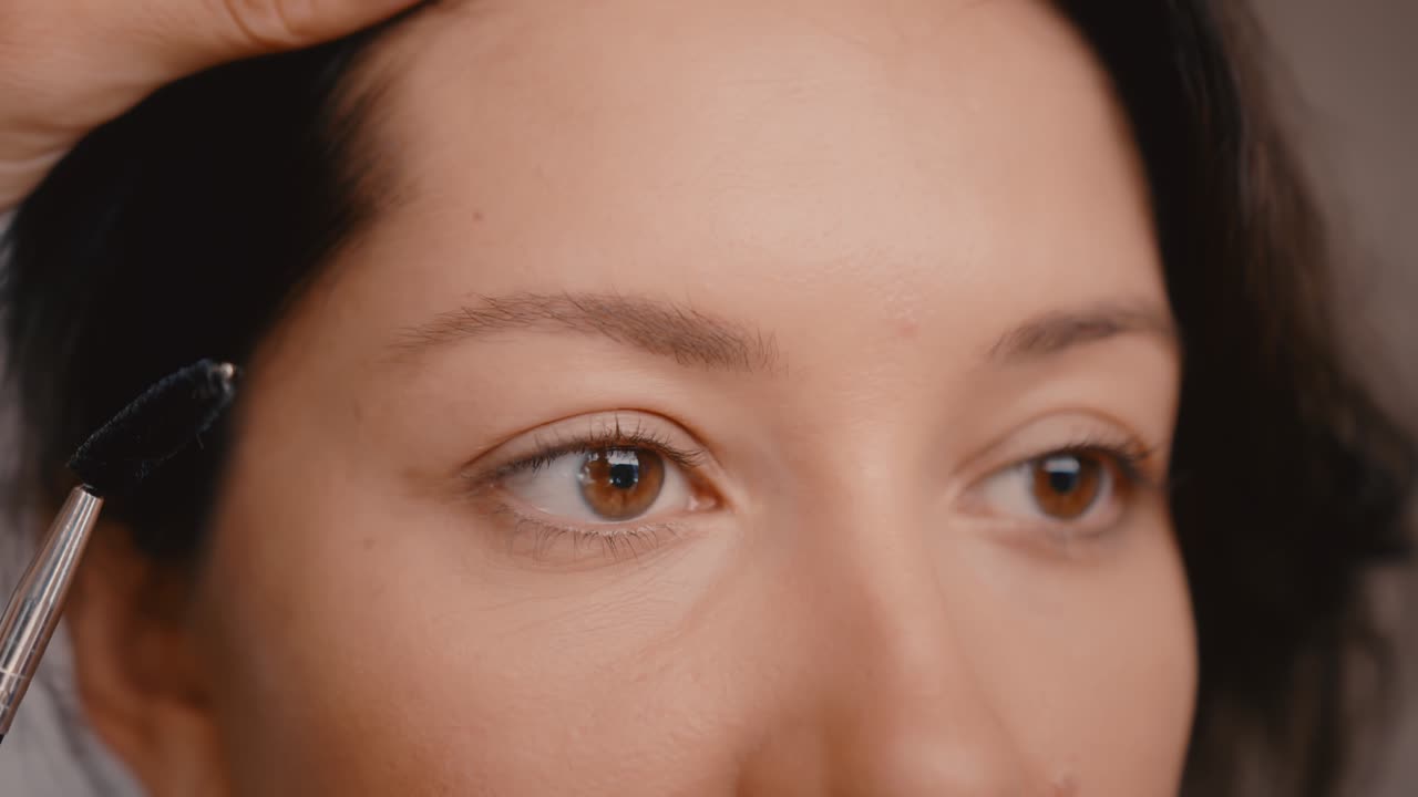 Woman getting her eyebrows done