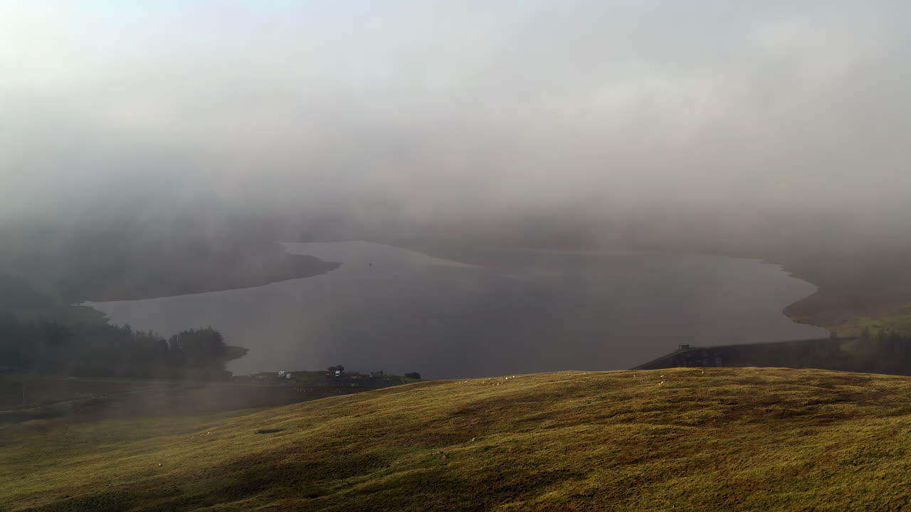 Static wide angle shot of the Spelga dam