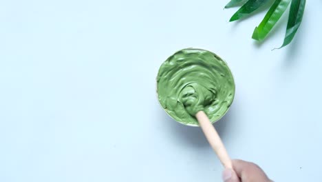 preparing a green clay mask