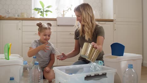 Video-of-family-separating-recycling-material-in-the-kitchen