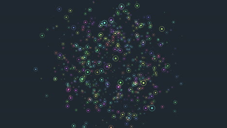 círculo de puntos vibrantes contra fondo negro patrón de colores