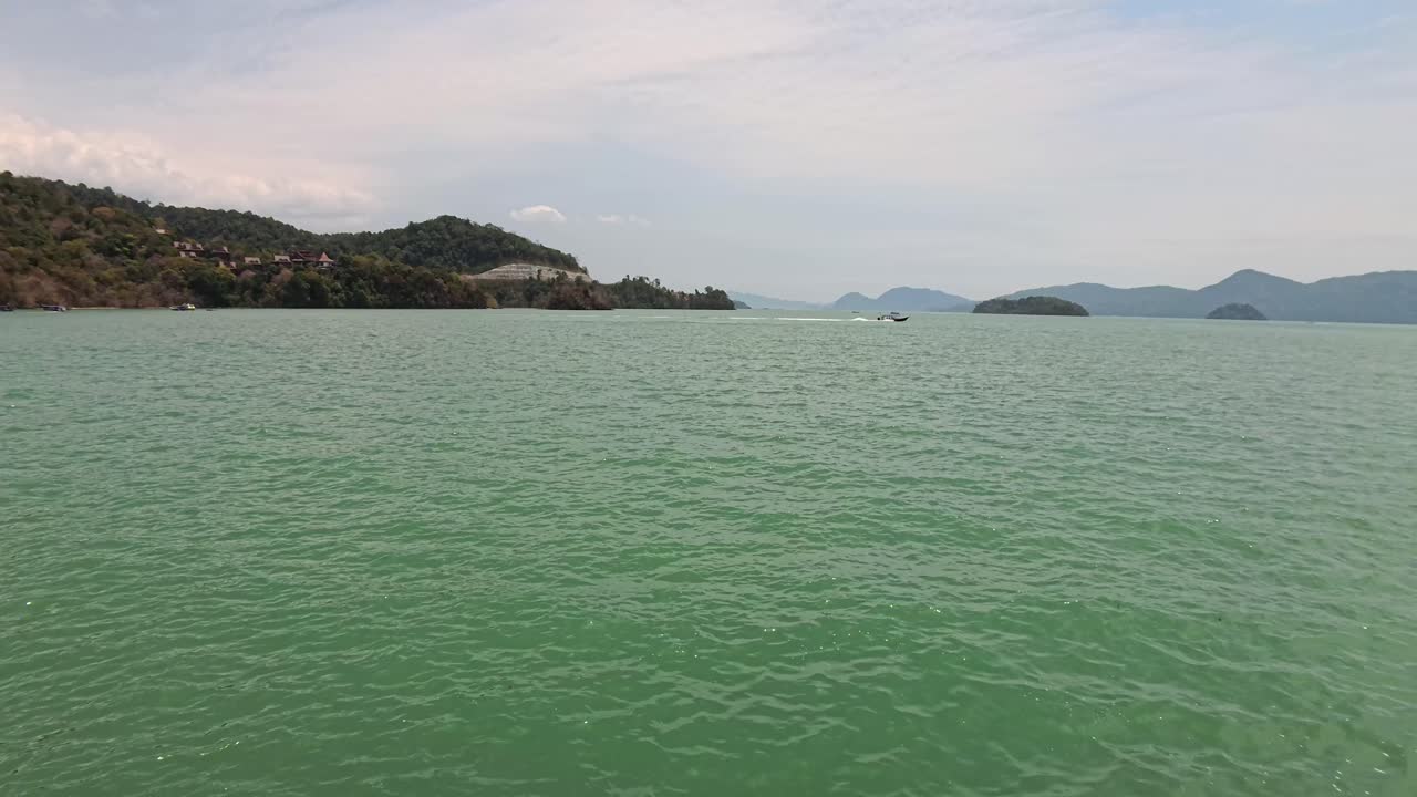 Coastal landscape with green sea and islands