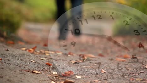 white clock and fallen leaves