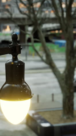 a streetlamp in the city at night