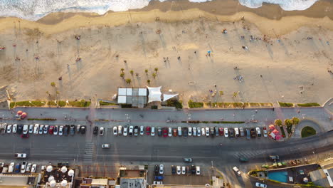aerial: from buildings of a beach shore to ocean