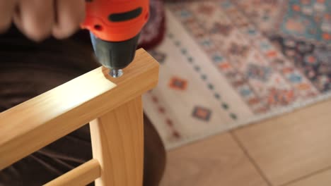 assembling wooden furniture with a power drill