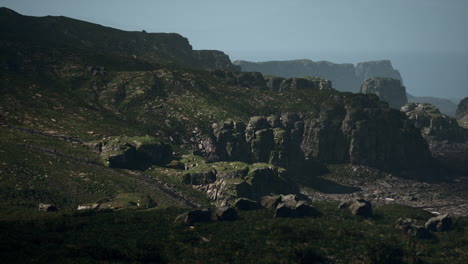 majestic mountains: a view of rugged cliffs and verdant slopes