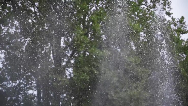 Slow motion of fountain water splashes