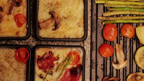 French Swiss or Spanish restaurant with traditional tapas food, Spanish cuisine, delicious tapas and cheese plate, bruschetta with cheese, olives dry tomatoes and tasty sandwich bar appetizer, buffet