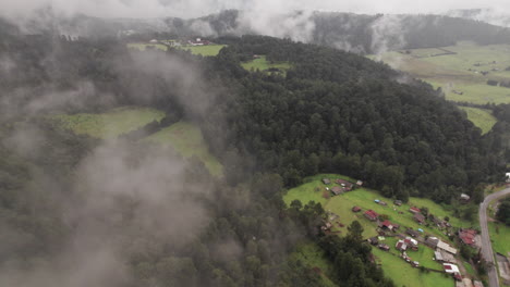 Aerial-flight-through-cloud-mist-over-Valle-De-Bravo-in-Mexico