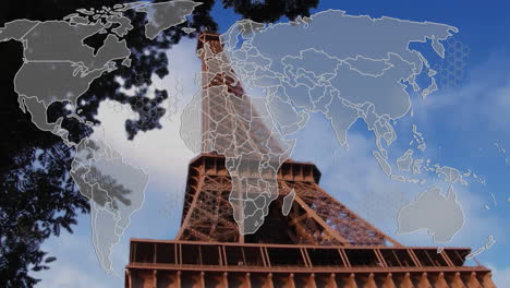 world map animation over eiffel tower against blue sky background