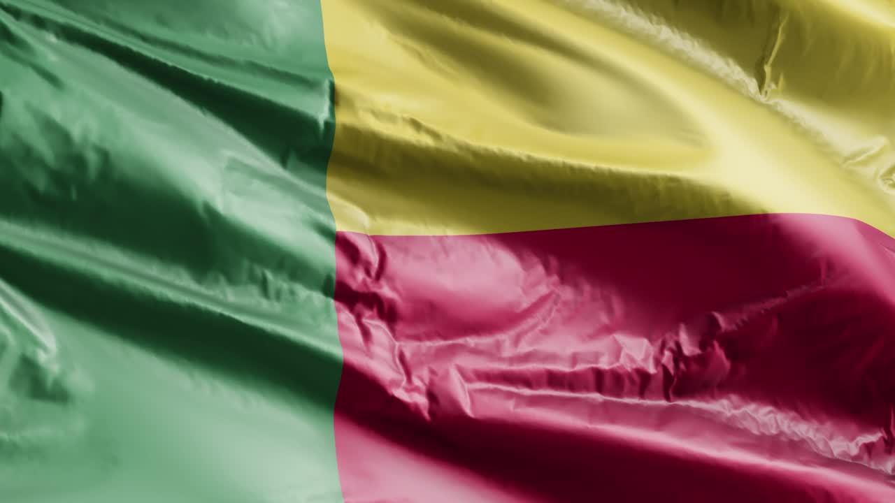 Bandiera del Benin che sventola lentamente al vento in loop. Sfondo a pieno schermo. Loop di 20 secondi