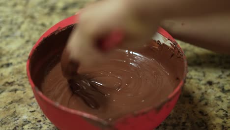 bowl with melted chocolate confectioner prepare premium hand-crafted