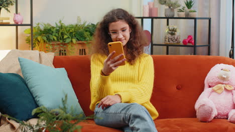young teen kid girl texting share messages content on smartphone social media applications online