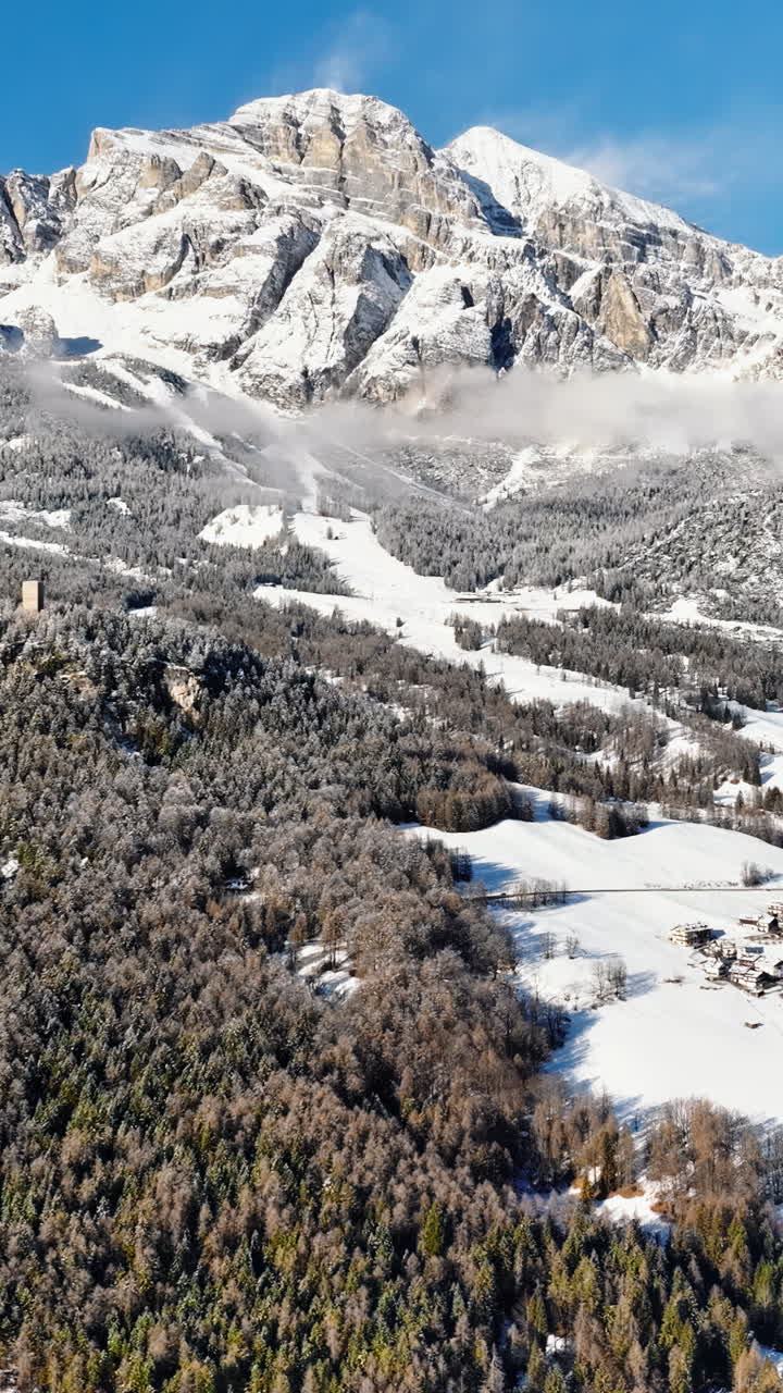 Aerial drone view of the Cortina d'Ampezzo town in the Dolomites, Italy. Vertical