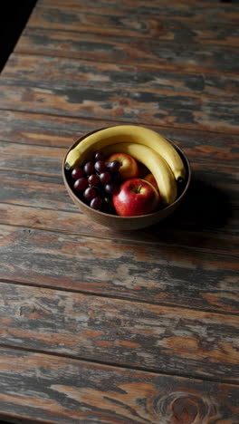 fruit bowl on wooden table