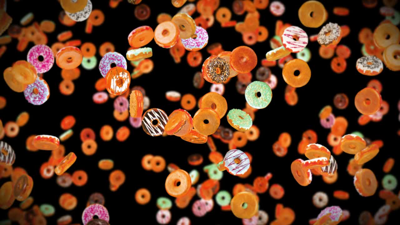 검은 바탕에 많은 다채로운 도을 날아. 도 케이크, 과자, 디저트. 도 회전의 3d 애니메이션. 루프 애니메이션.